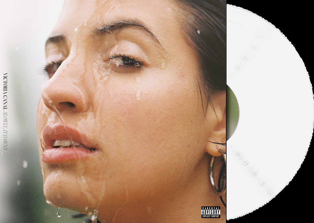 Vinyl record cover featuring a portrait of a woman with water droplets.