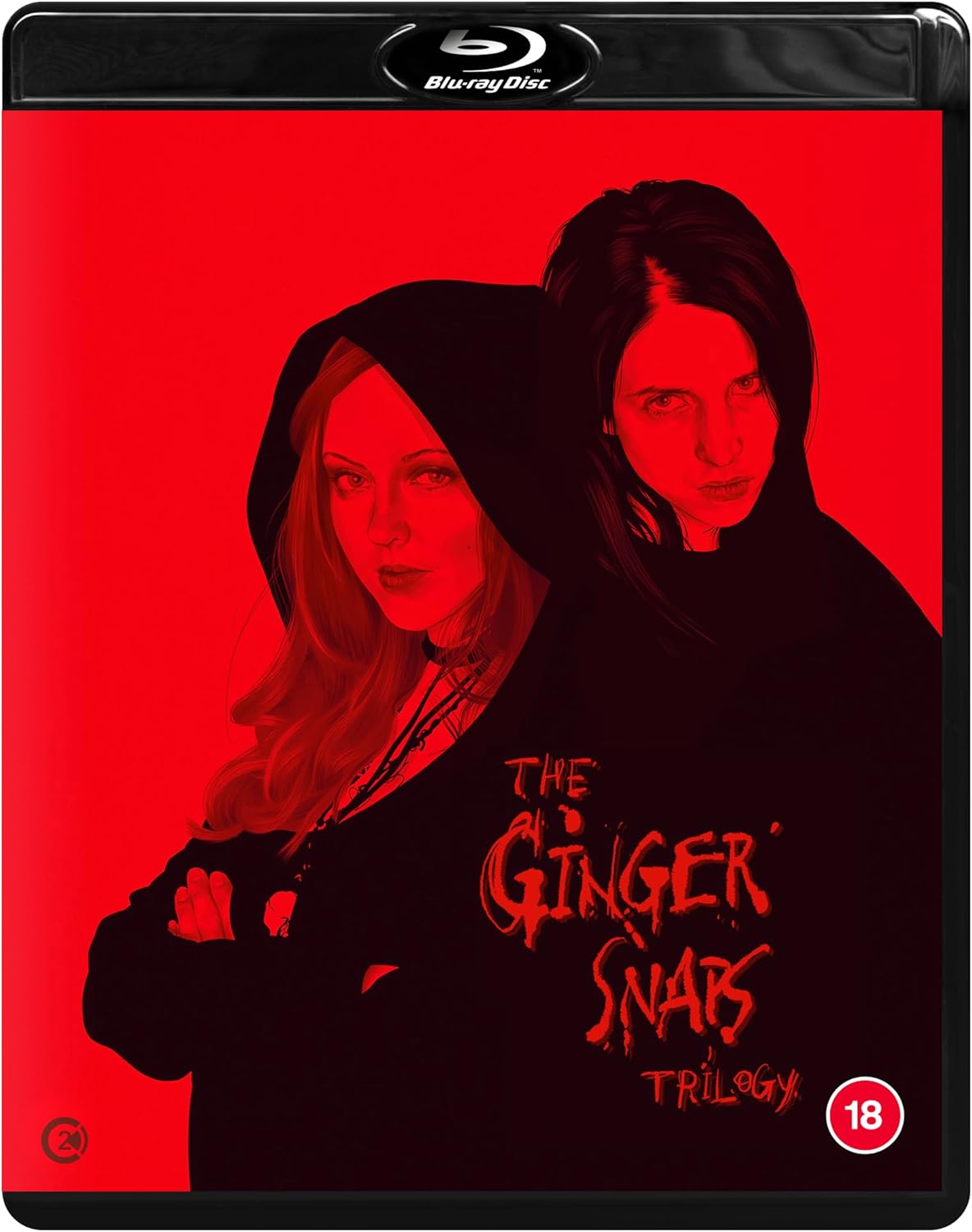 The Blu-ray case features two women in dark clothing on a red background.