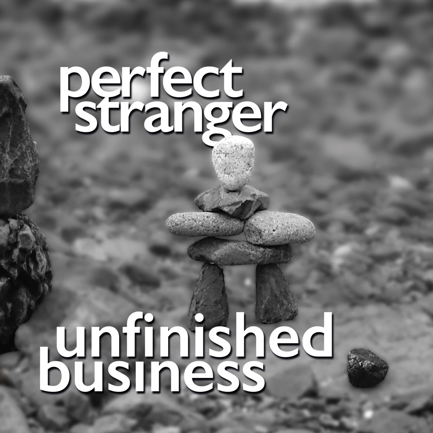 CD cover for "Perfect Stranger - Unfinished Business" with stacked stones.