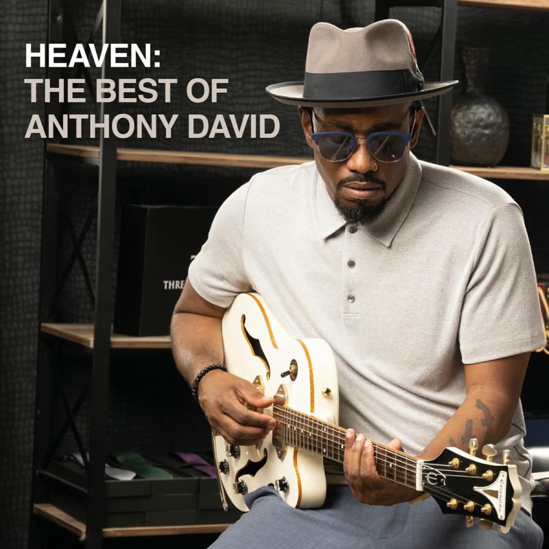Anthony David album cover: man with guitar, wearing hat and sunglasses.