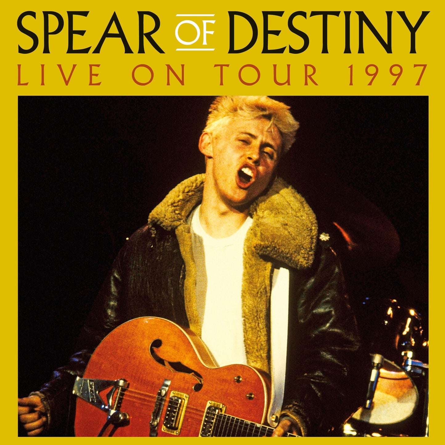 Spear of Destiny album cover featuring a singer with a guitar.