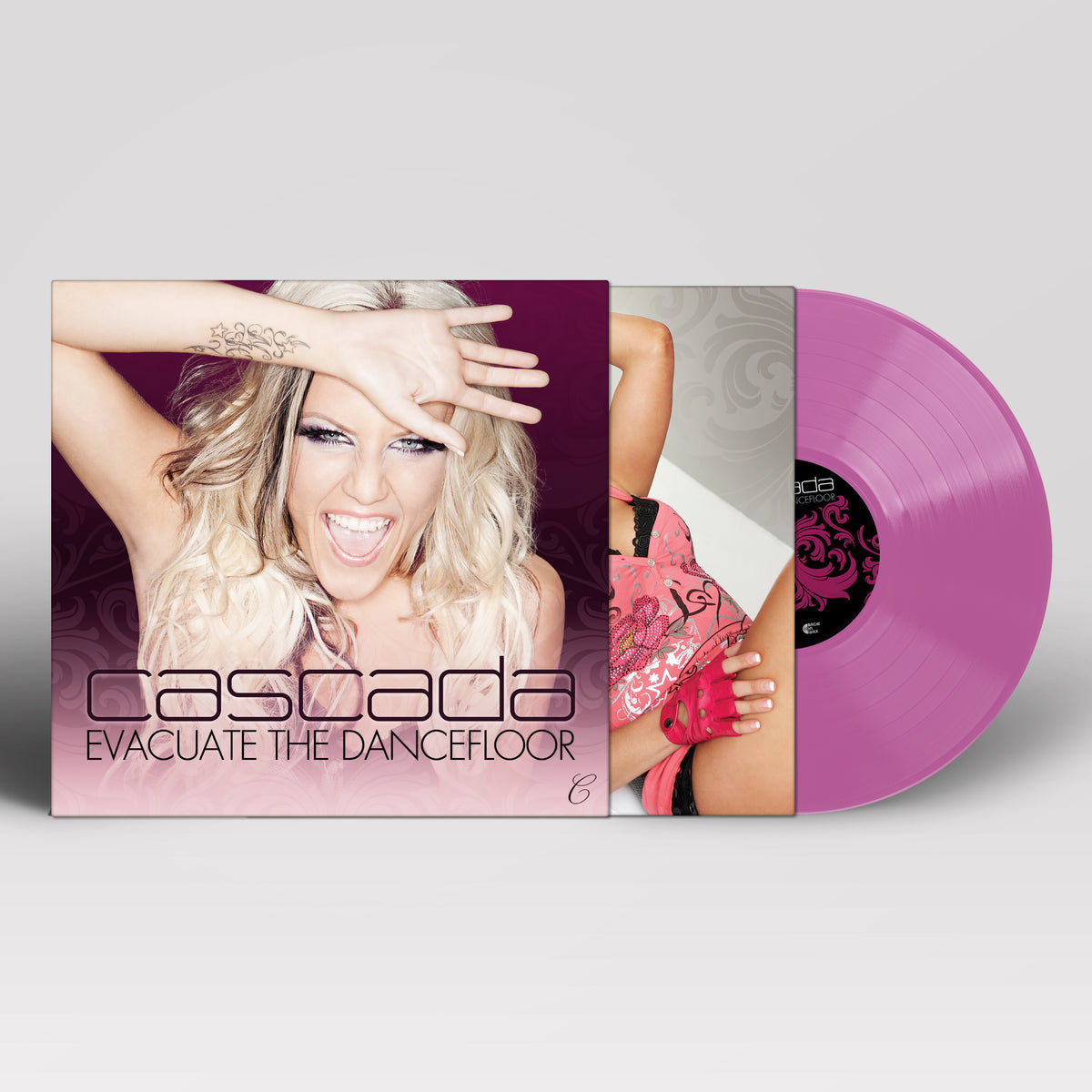 Cascada album cover with pink vinyl record; woman with blonde hair smiling.
