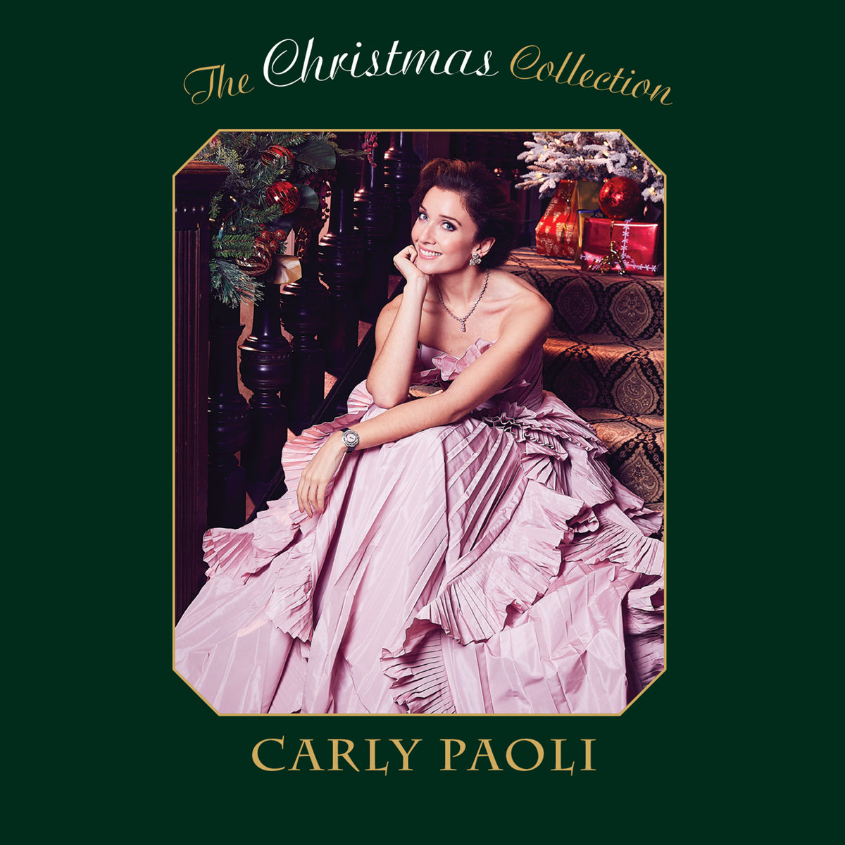 Carly Paoli album cover featuring a woman in a pink gown, Christmas decor.