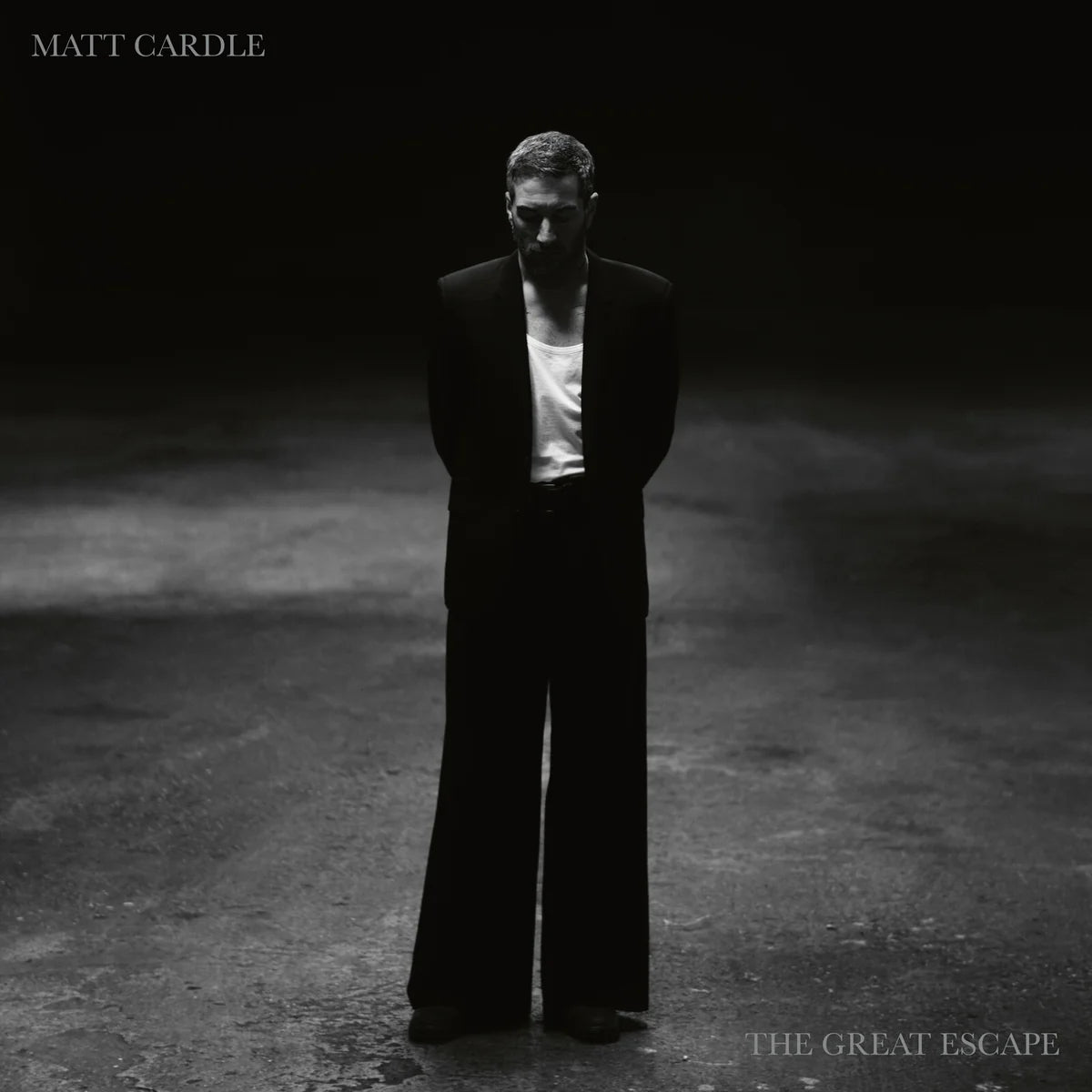 Matt Cardle album cover, black and white portrait of a man in a suit.