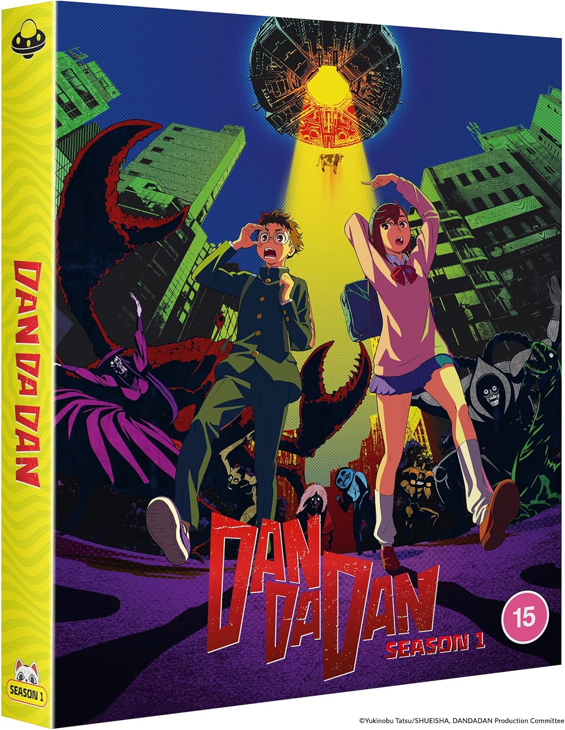 Blu-ray cover for “DAN DA DAN” featuring students fleeing a giant monster.