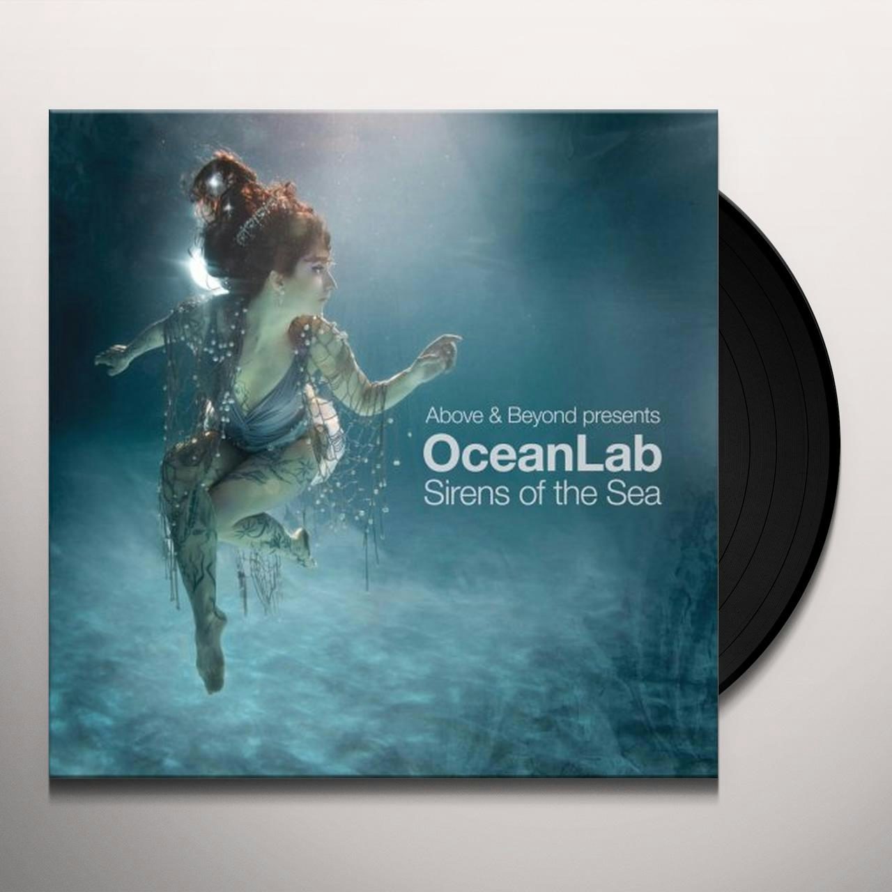 Vinyl record cover featuring a painting of a woman emerging from water.