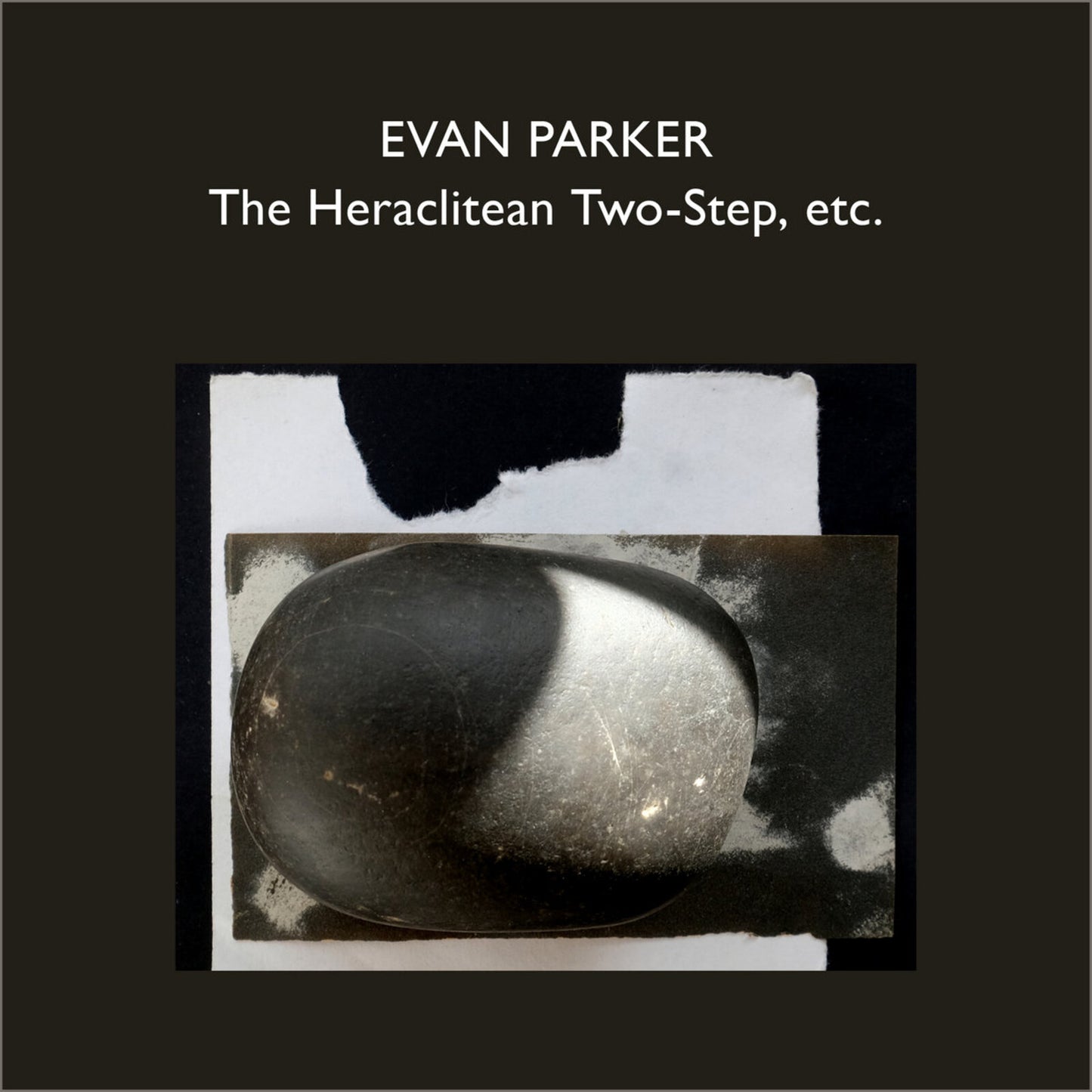 CD cover with text Evan Parker, The Heraclitean Two-Step, etc. featuring a dark smooth stone.