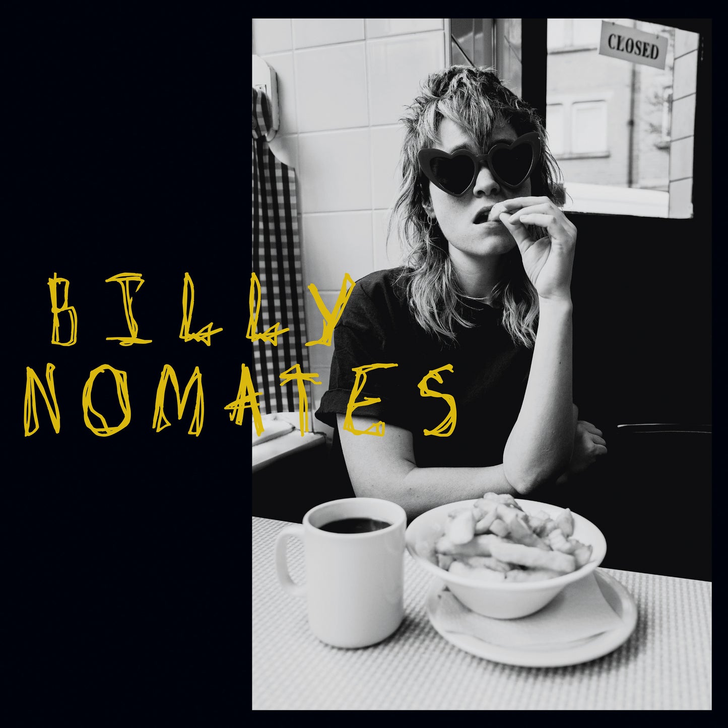 Black and white album cover featuring a woman with heart-shaped sunglasses.