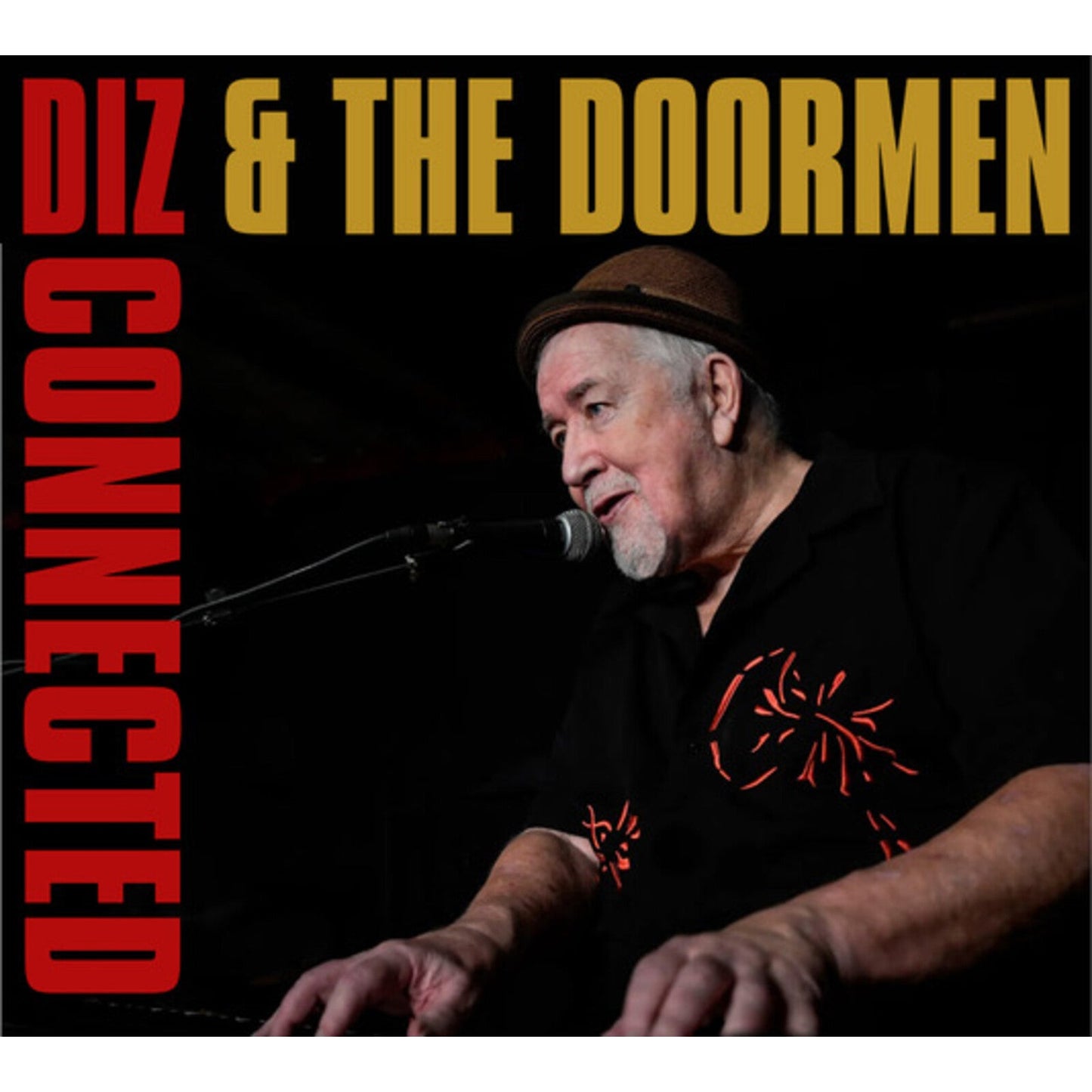 CD cover featuring Diz Watson, a man with a hat, at a microphone.