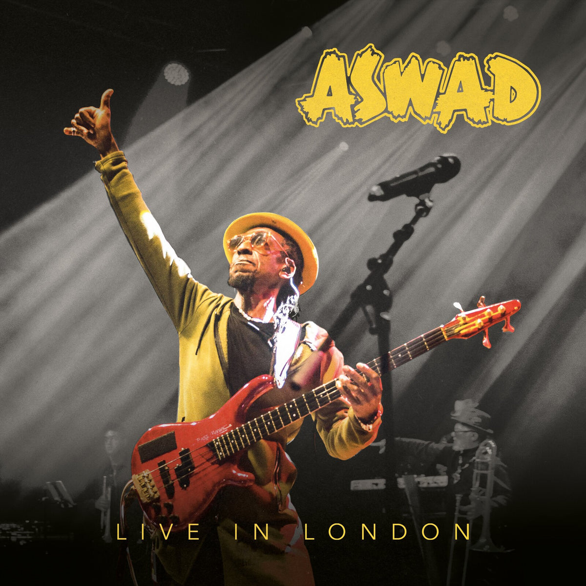 Aswad "Live In London" CD cover featuring a musician with a bass guitar.