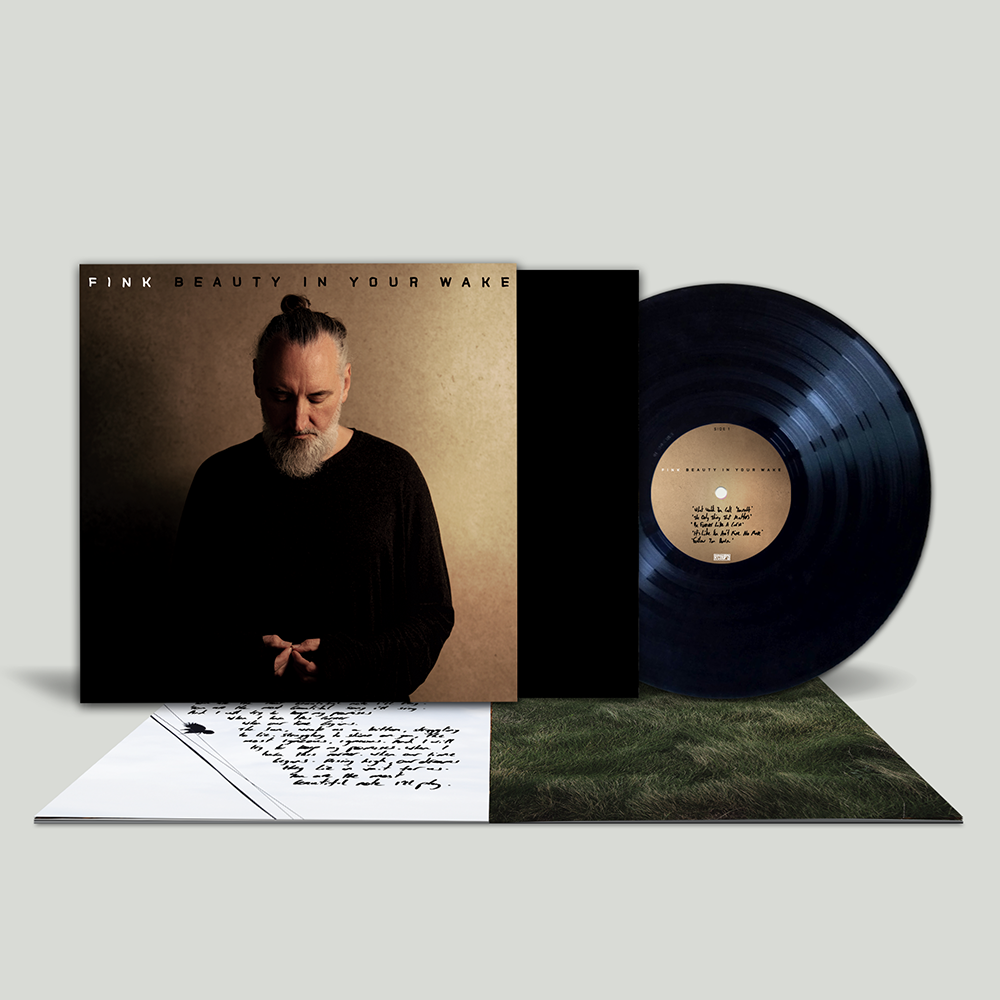 Fink album “Beauty In Your Wake” vinyl record and handwritten lyric sheet.