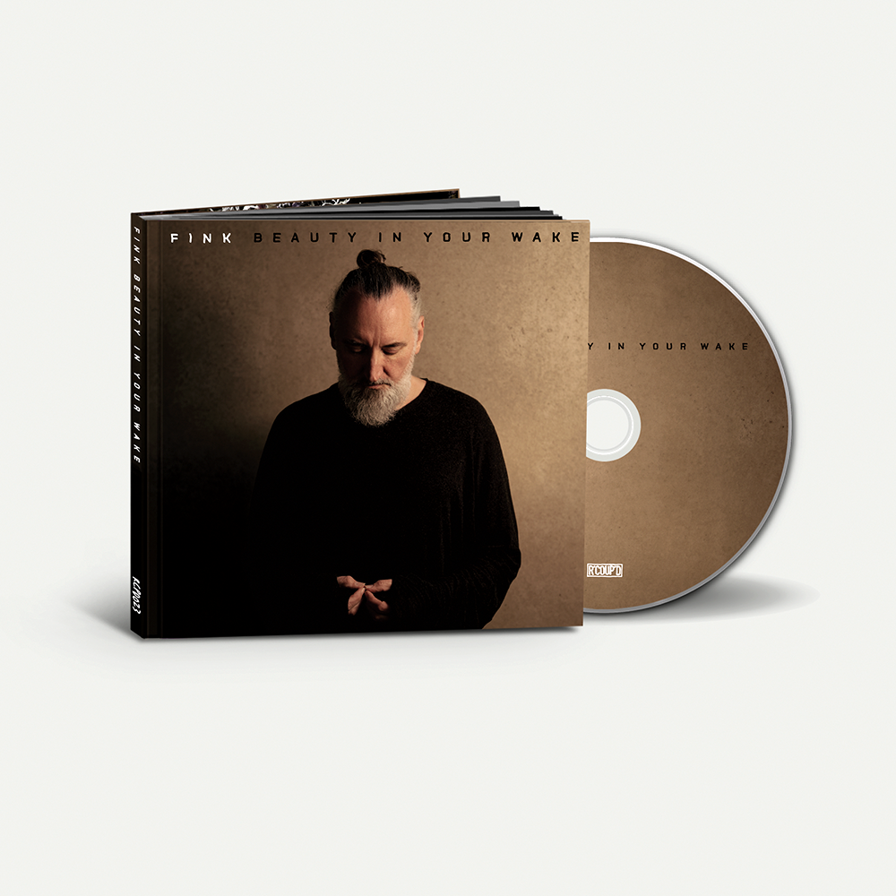 CD case for Fink’s “Beauty In Your Wake (Deluxe Edition)” with portrait.