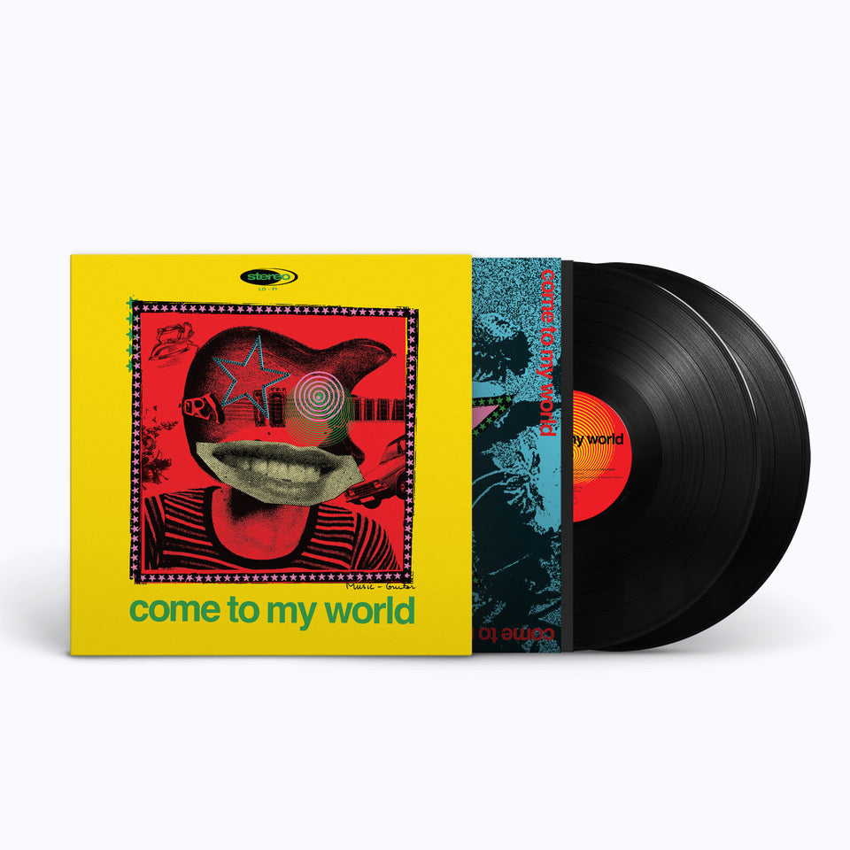 Yellow vinyl record album "Come To My World" with two black LPs.