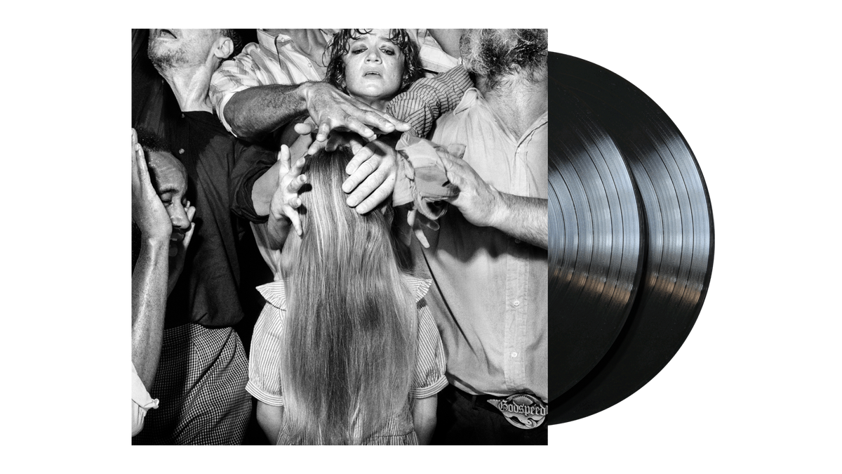 Black and white vinyl record with a photo of a crowded embrace.