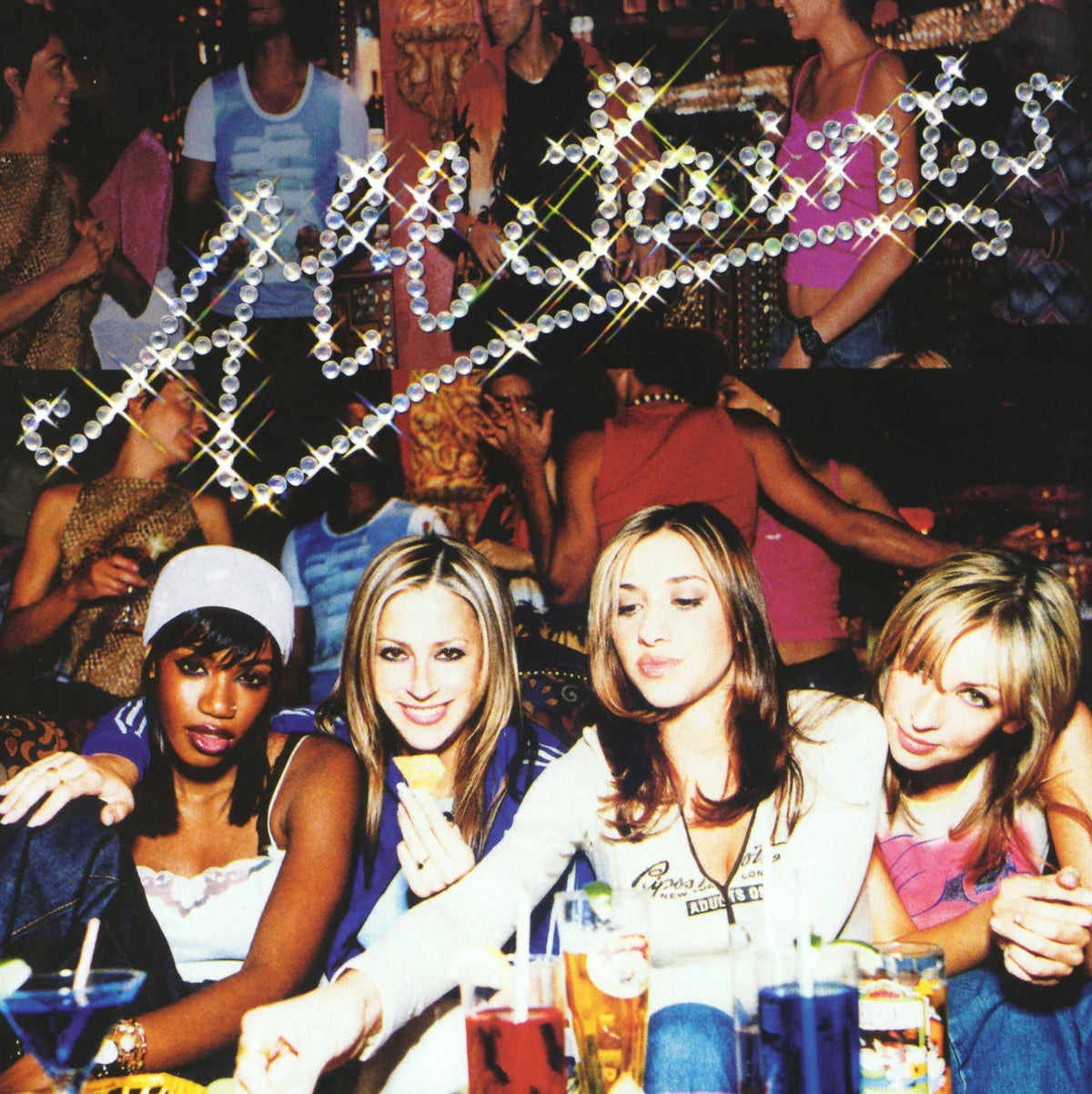 All Saints album cover featuring the four band members in a crowded room.