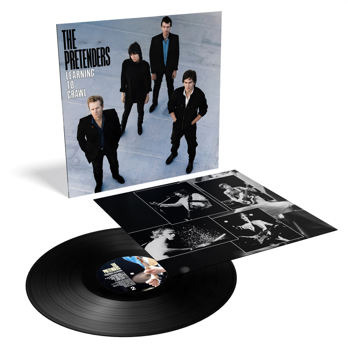 The Pretenders’ “Learning to Crawl” vinyl record and album cover with band photo.