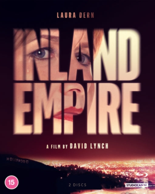 "Black Blu-ray cover with 'INLAND EMPIRE' title and 'A WOMAN IN TROUBLE' subtitle."