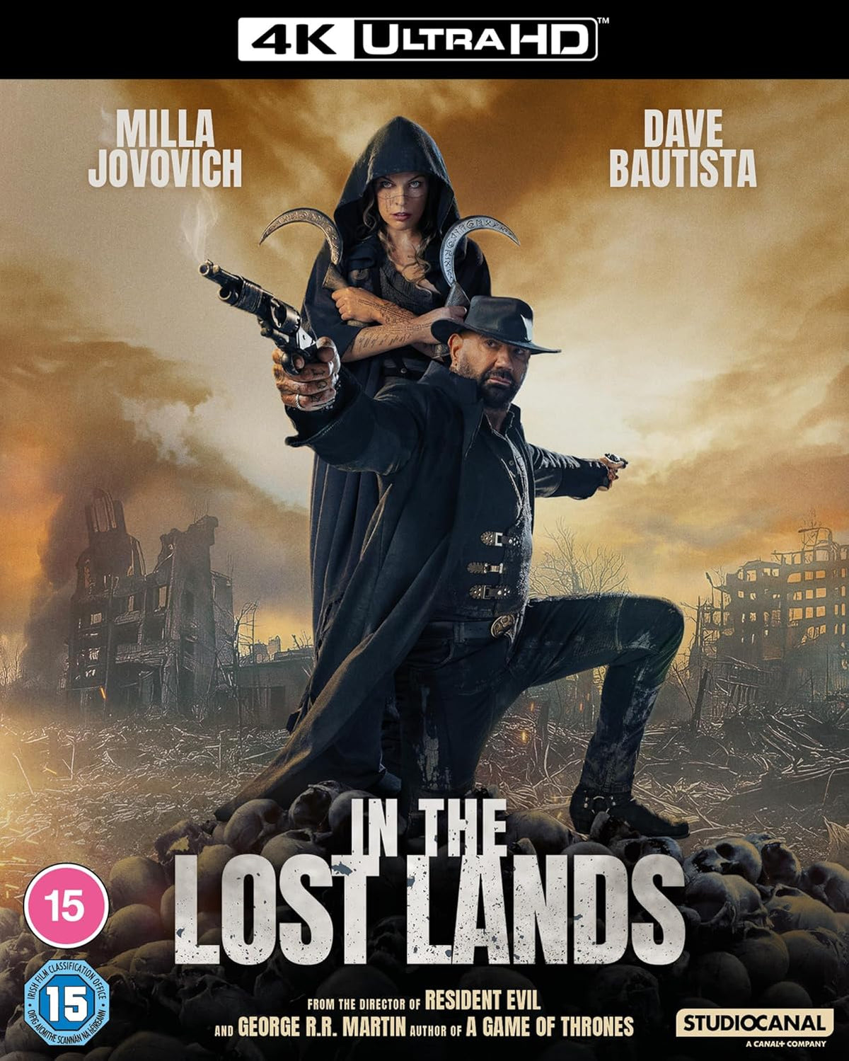 “In The Lost Lands” UHD Blu-ray cover featuring Milla Jovovich and Dave Bautista.