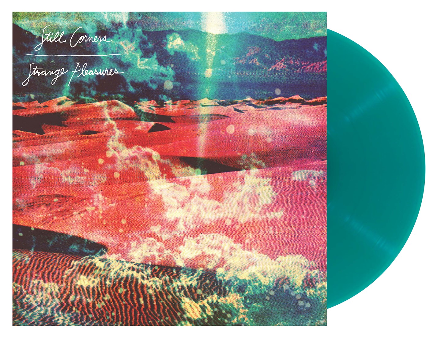 Still Corners "Strange Pleasures" vinyl record with a teal-colored disc.