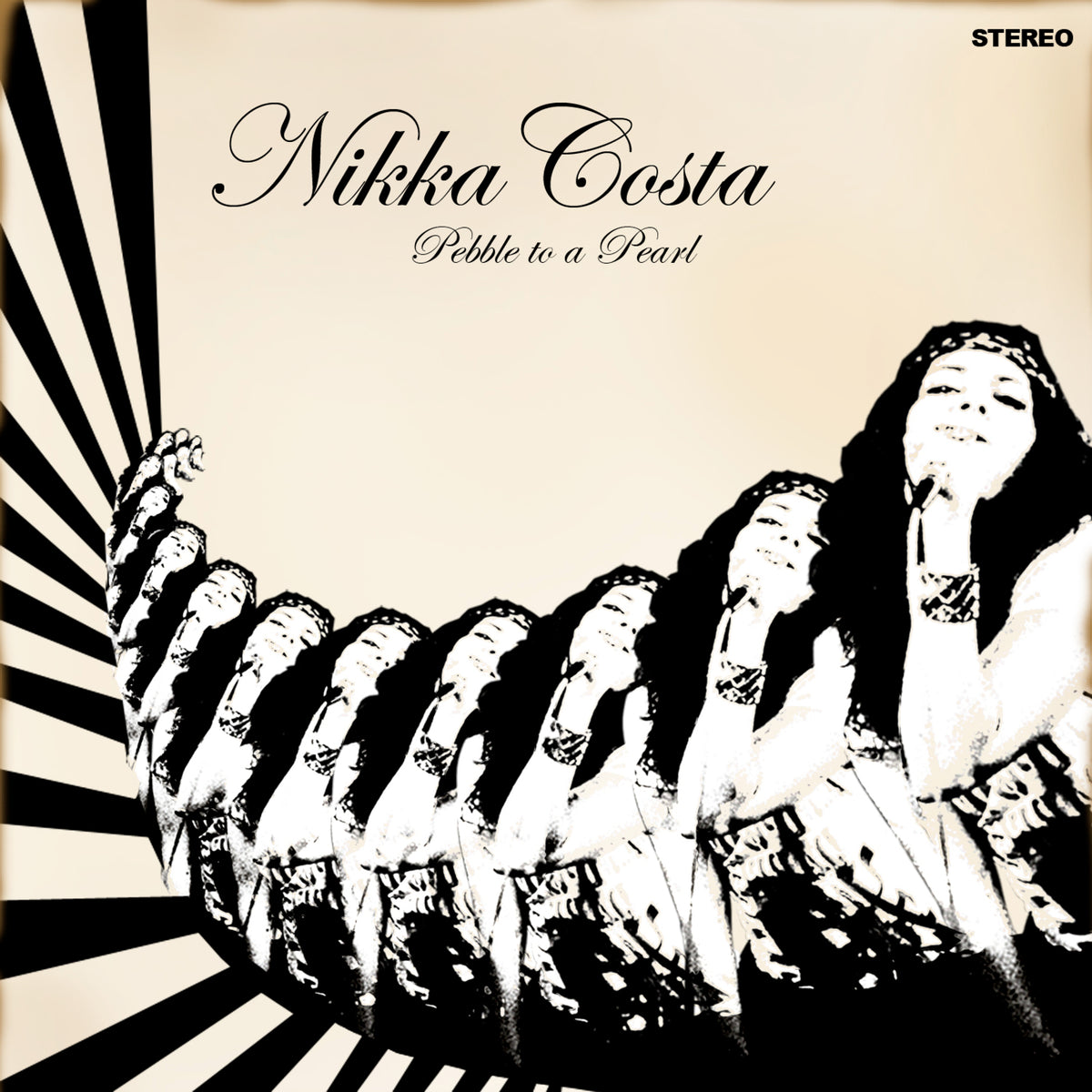 Nikka Costa's "Pebble to a Pearl" vinyl album cover, black and white.