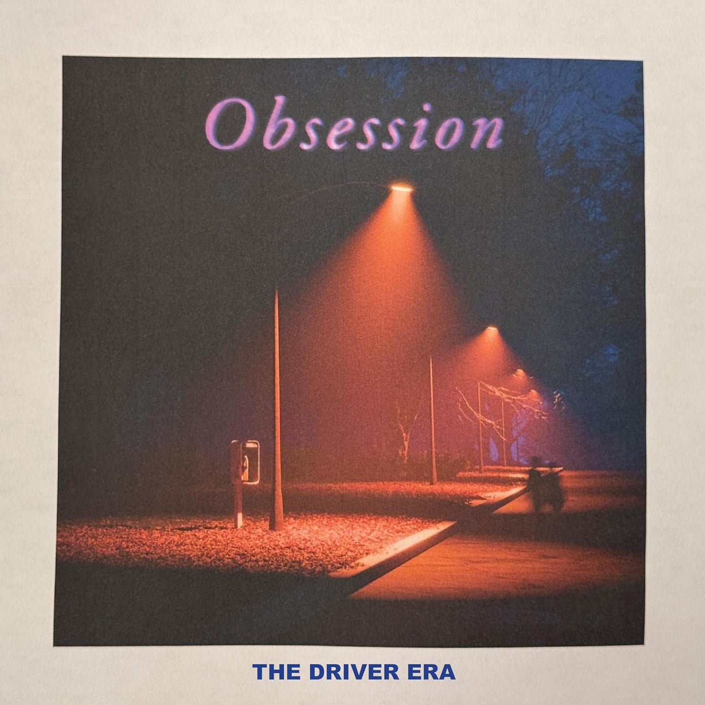 Vinyl record cover for "Obsession" by The Driver Era, night scene.
