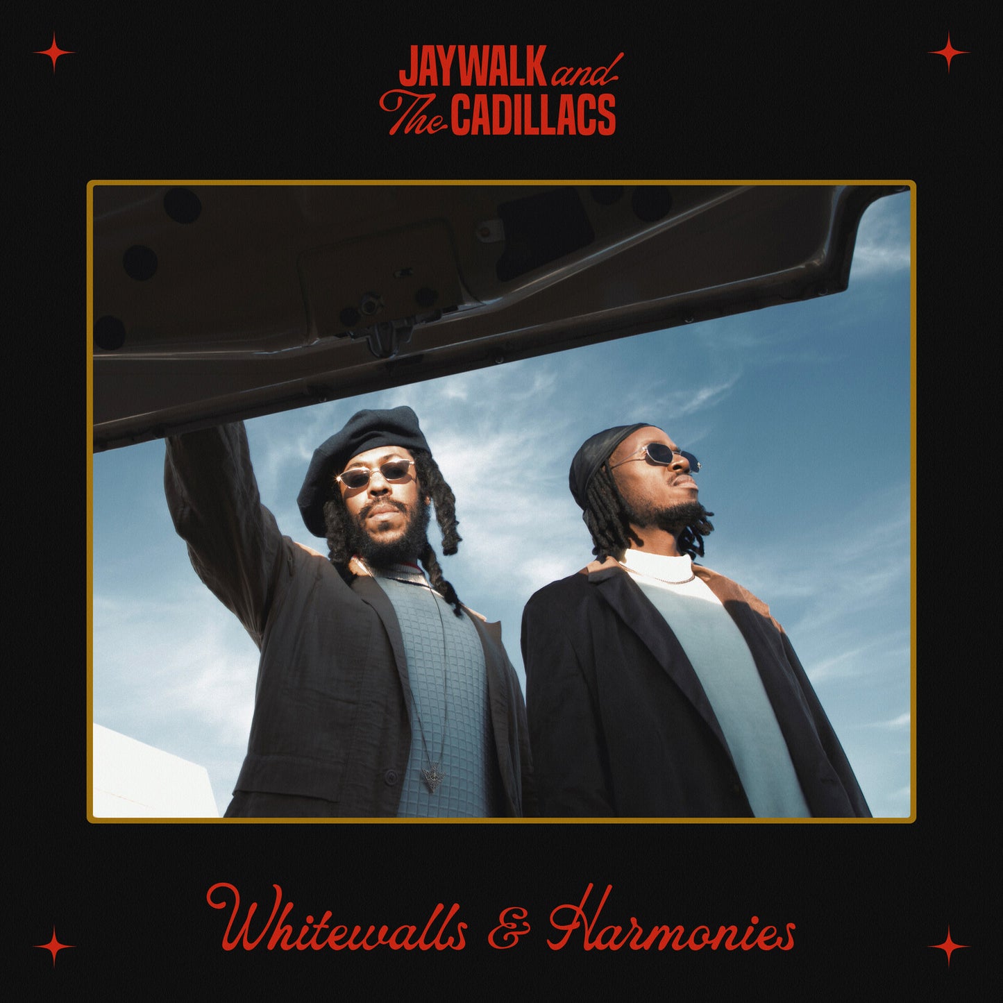 AlbumLCBC album cover featuring two men in blazers and sunglasses outdoors.