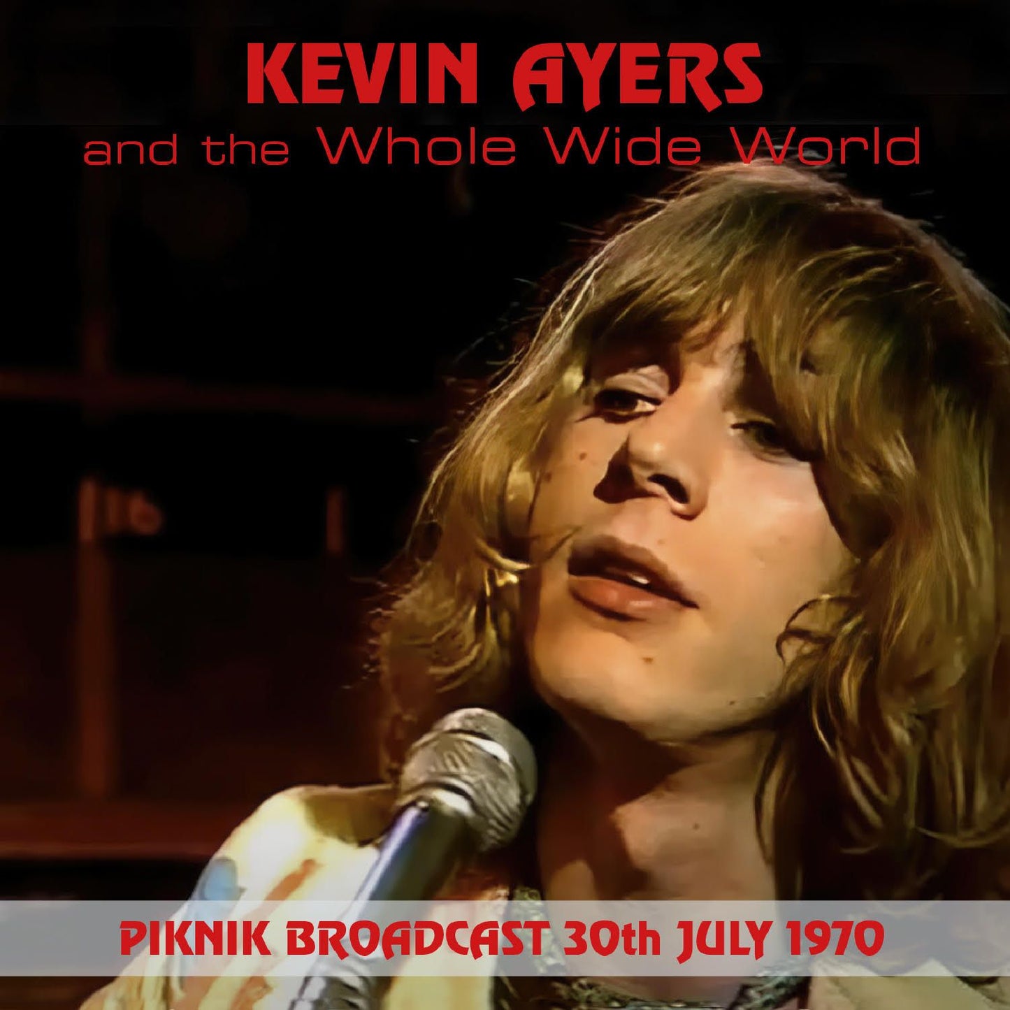 Kevin Ayers portrait on CD cover, speaking into a microphone.