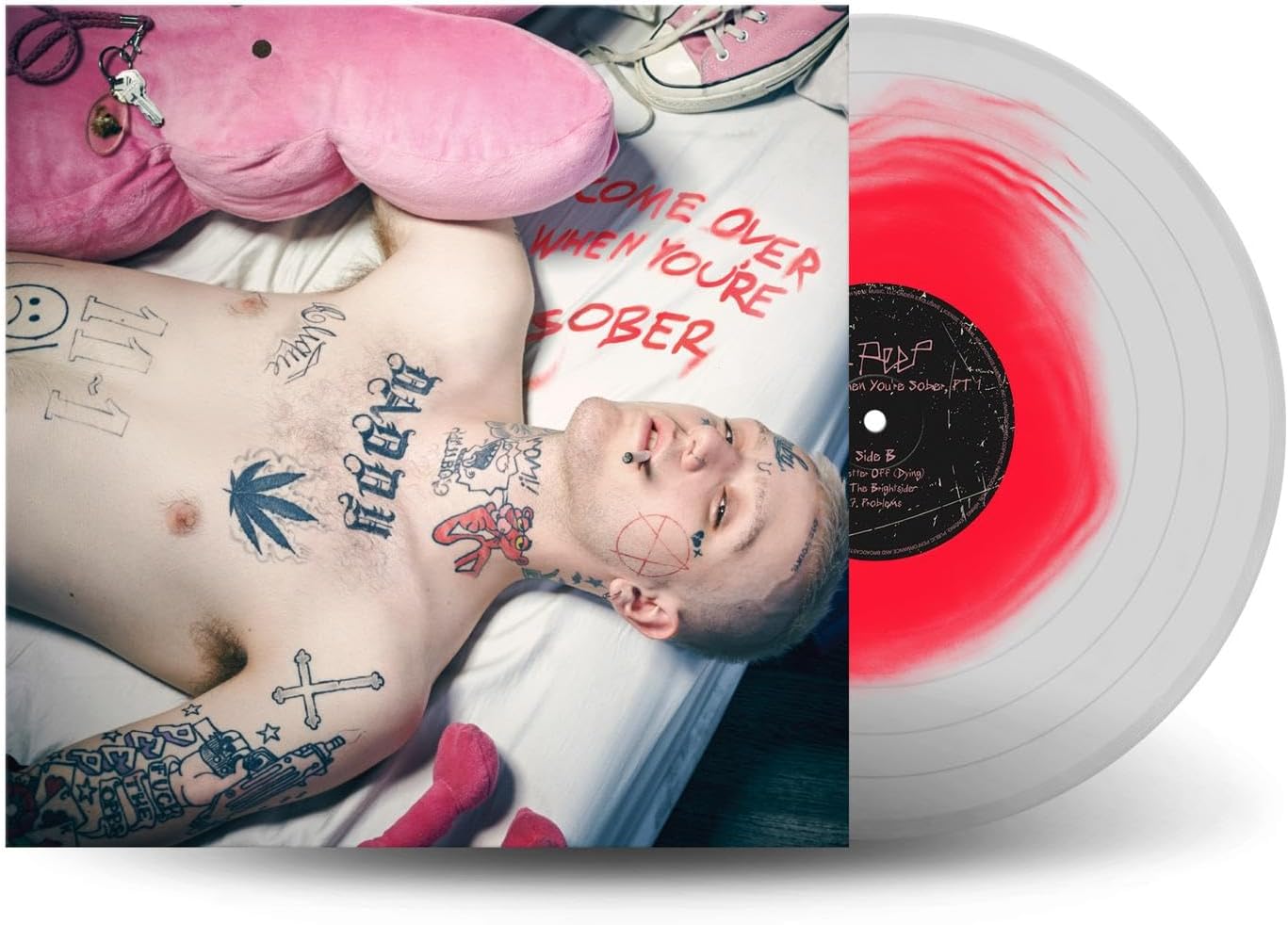 Lil Peep album cover with a person lying down and vinyl record.