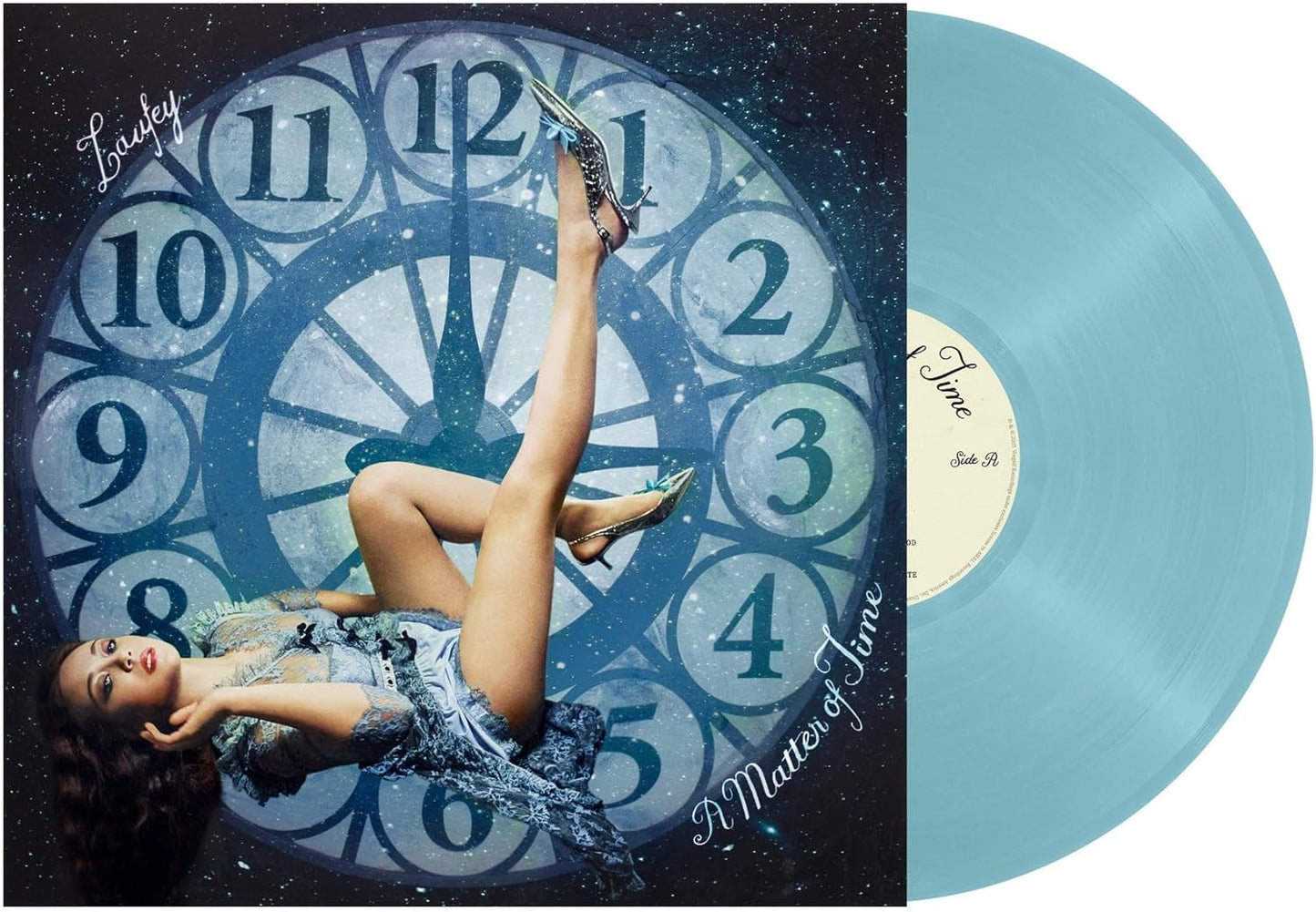 Blue vinyl record cover with a clock face and a reclining figure.