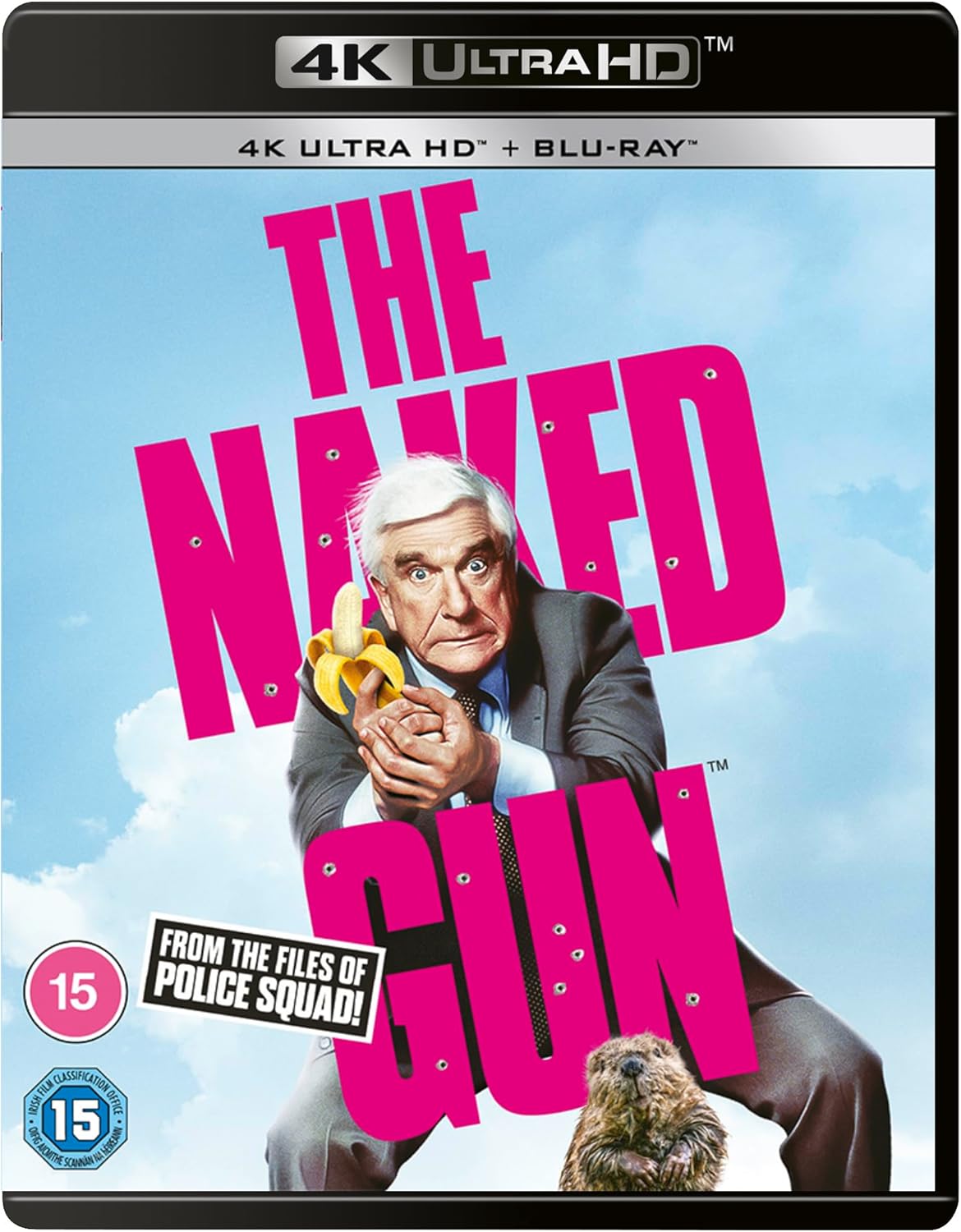 Leslie Nielsen as Frank Drebin holding a banana on movie cover.