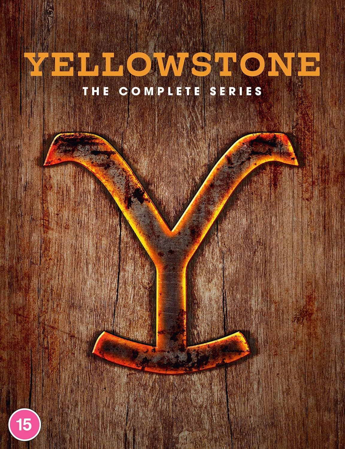 Yellowstone" DVD cover with a large, rusty "Y" on a woodgrain background.