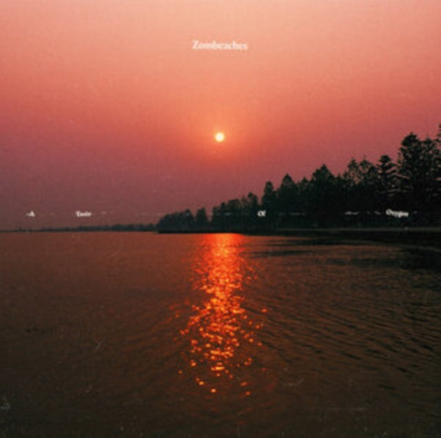 Red sunset over water with silhouetted trees and album title.