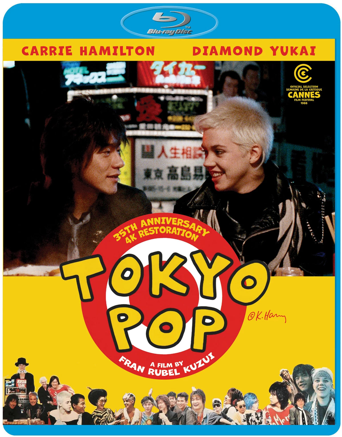Blu-ray cover for "Tokyo Pop" featuring a woman in a yellow coat amidst a crowd.