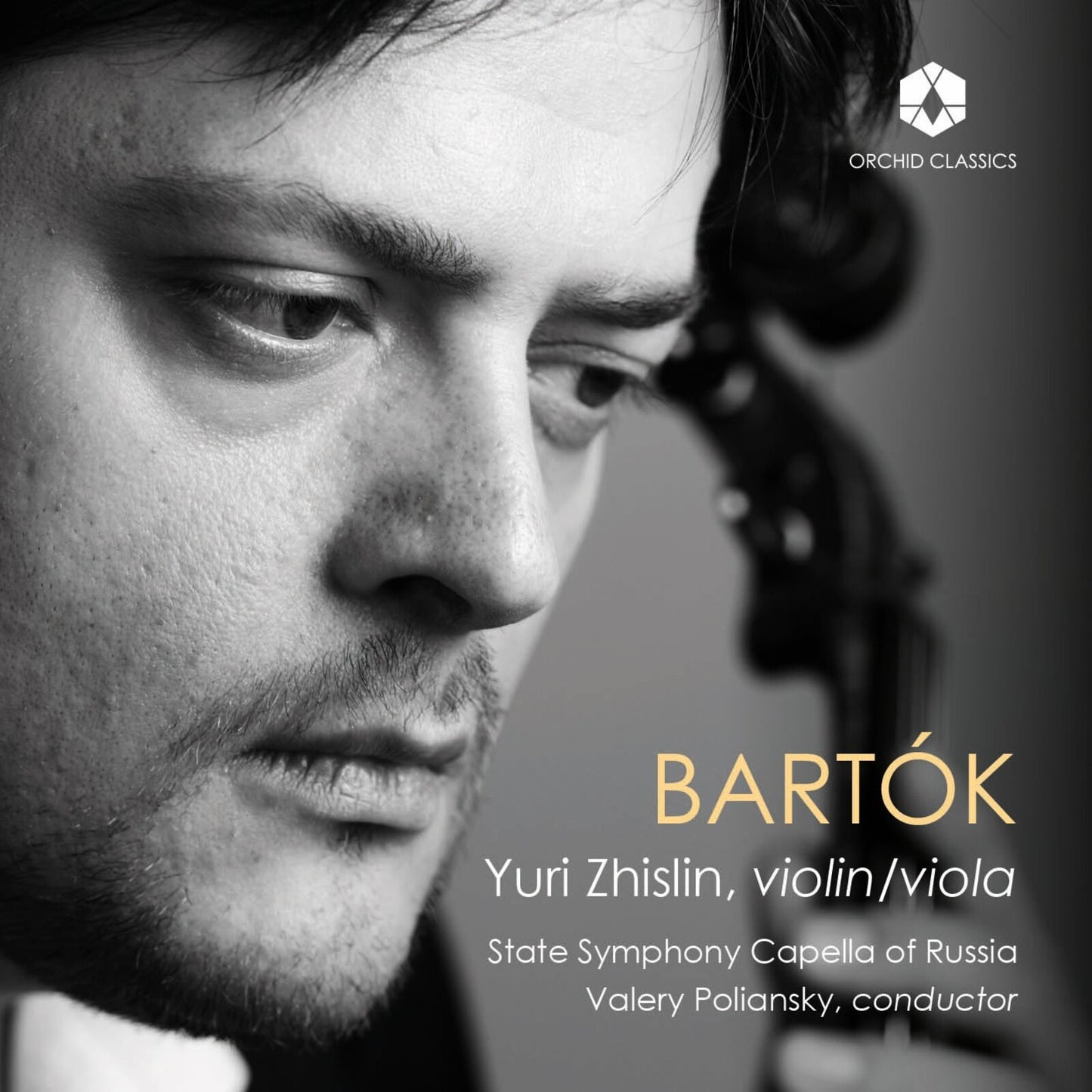 Black and white portrait of violinist Yuri Zhislin with "Bartók" text.