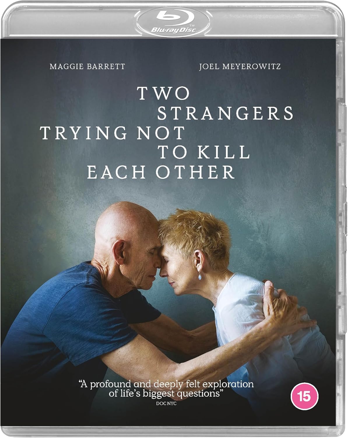 DVD cover showing a bald man and short-haired woman touching foreheads in embrace.