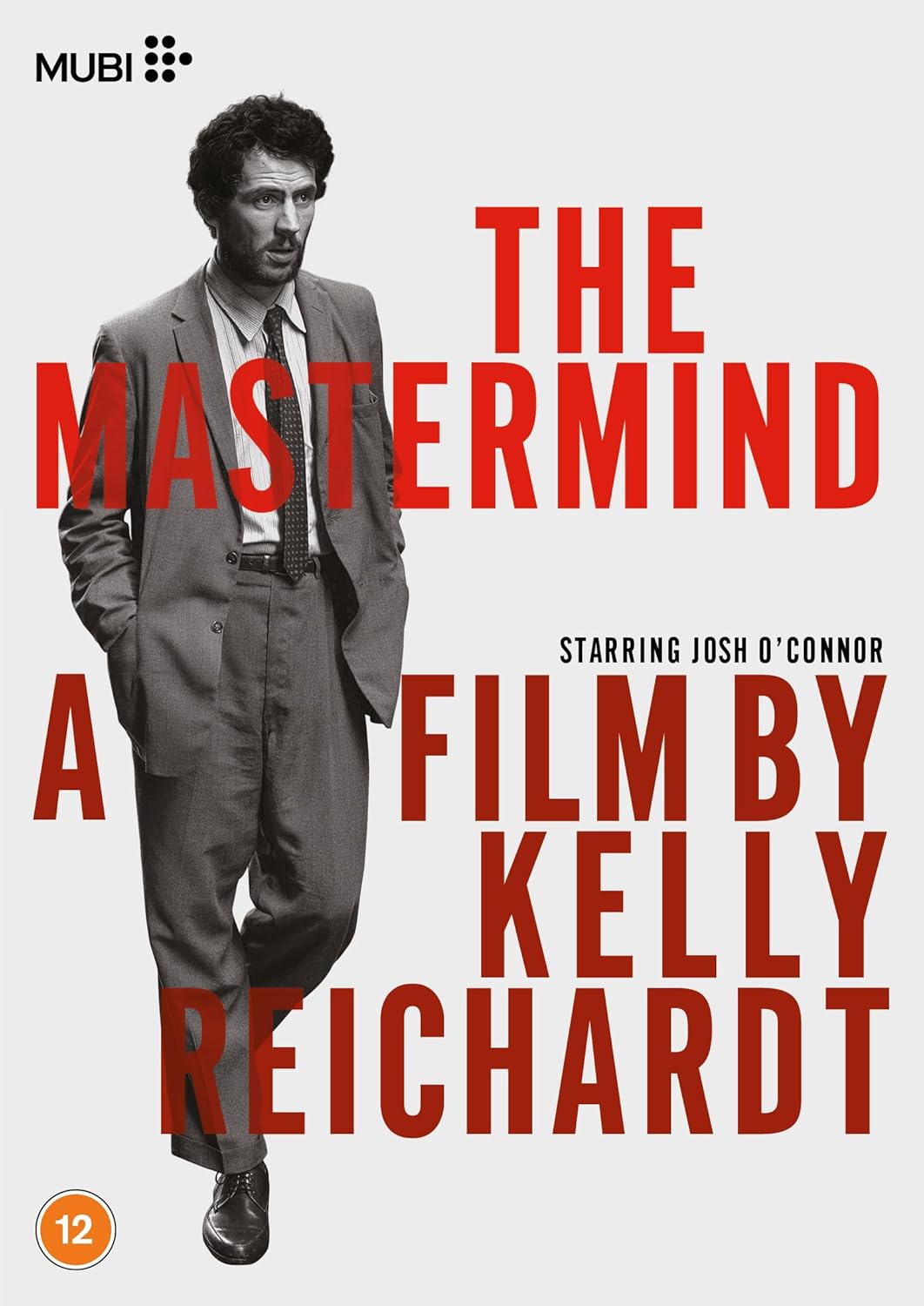 DVD cover for "The Mastermind" featuring a man in a suit.