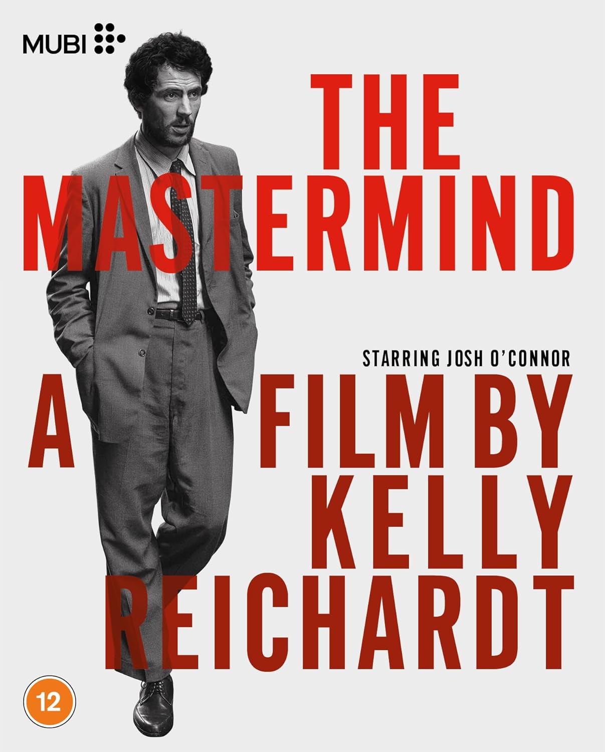 Black and white film poster featuring a man in a suit.