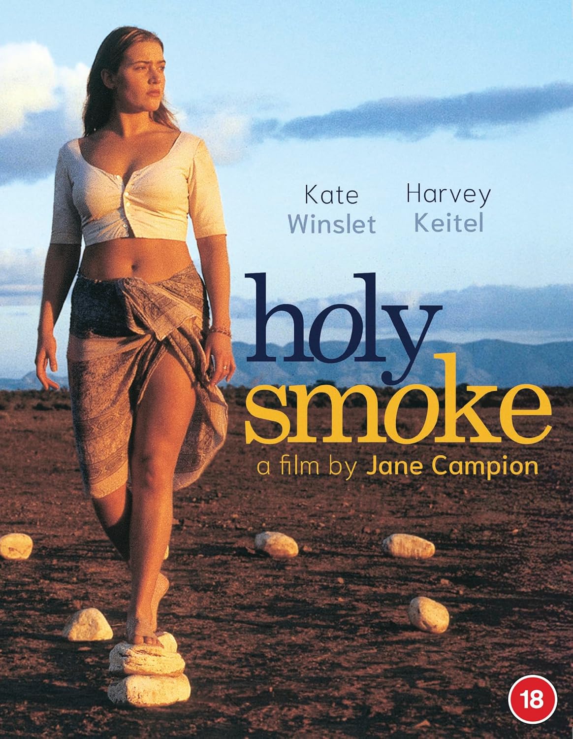 Kate Winslet walks across a desert landscape on the Holy Smoke Blu-ray cover.