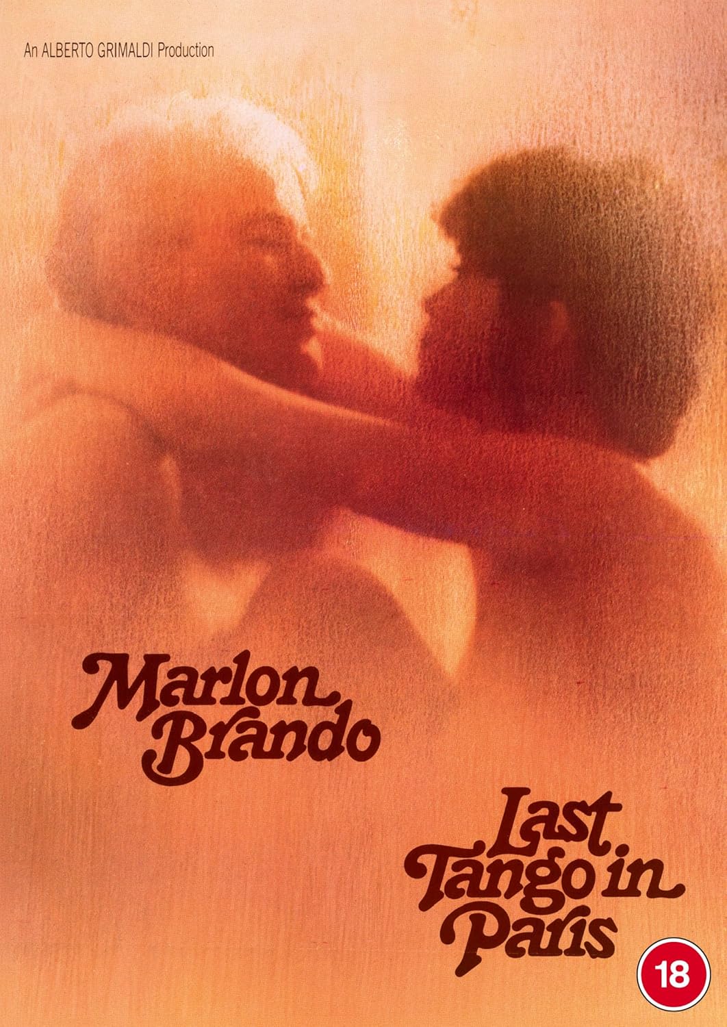 Blurred figures embrace on the cover of "Last Tango in Paris.