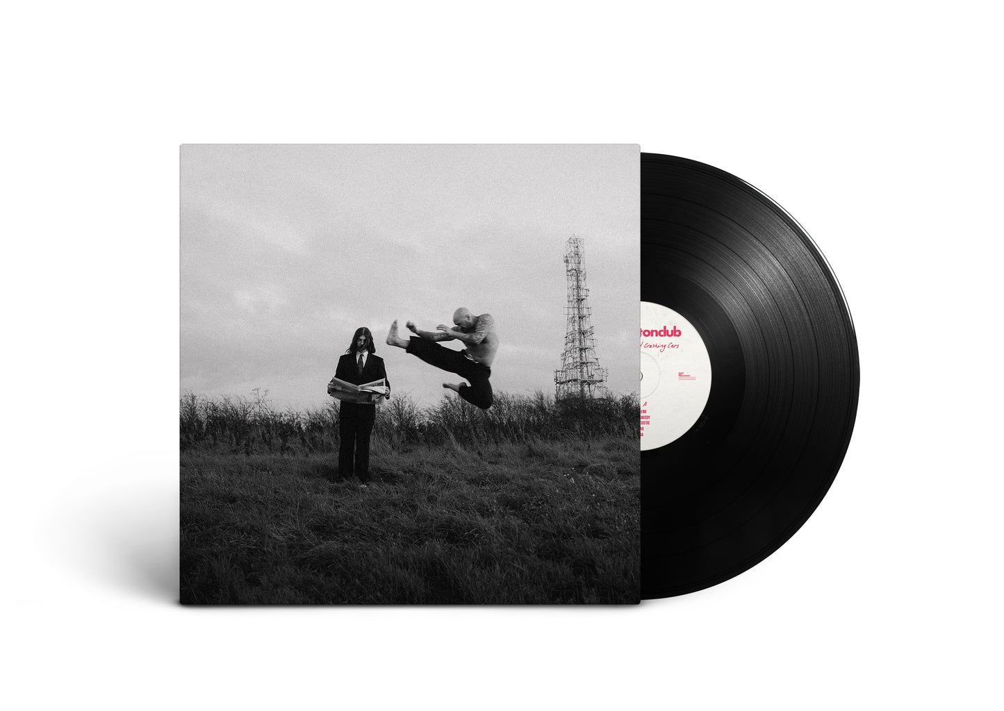 Vinyl record with black and white cover showing two figures in a field.