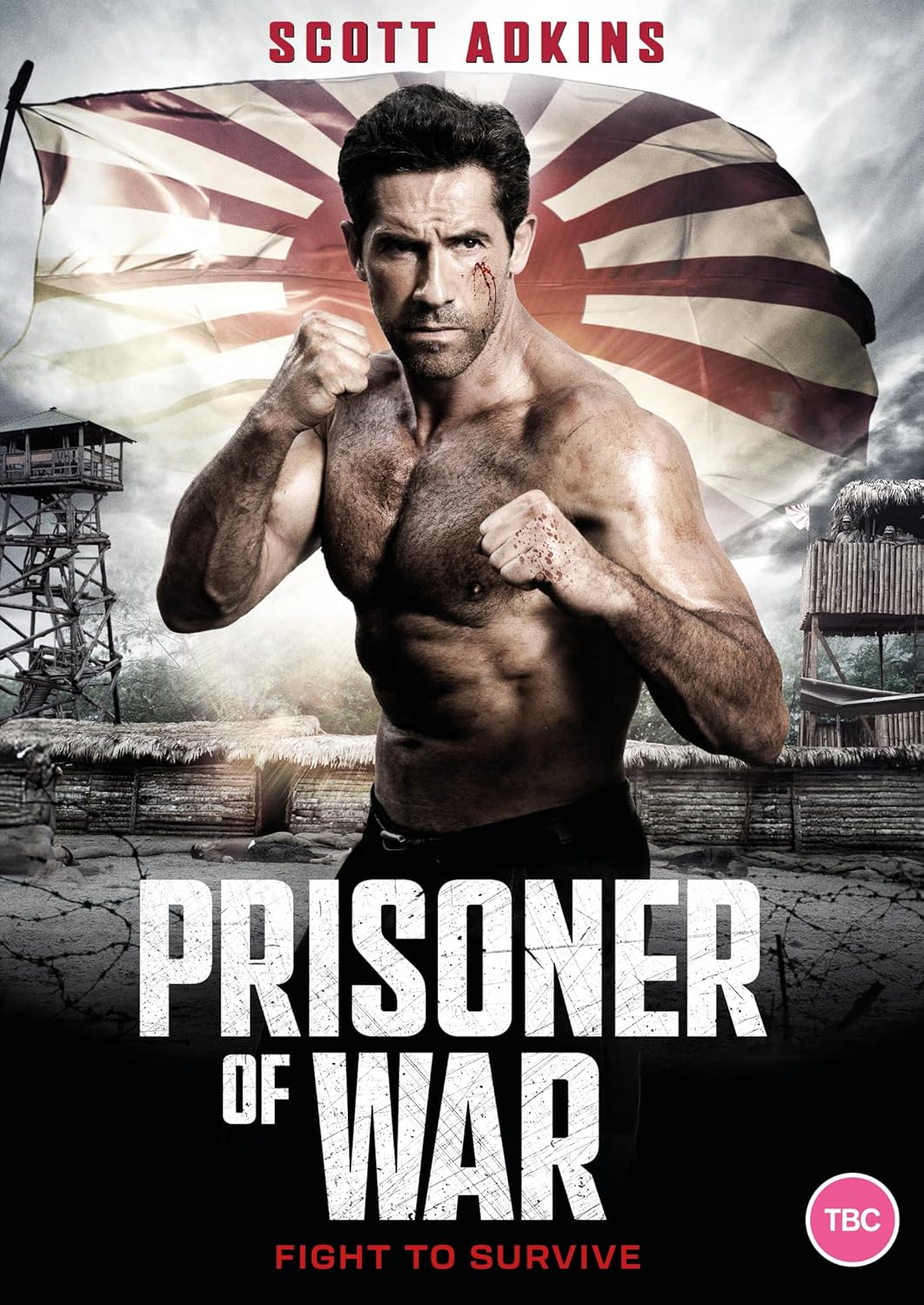 Muscular man in fighting stance before a prison camp background.