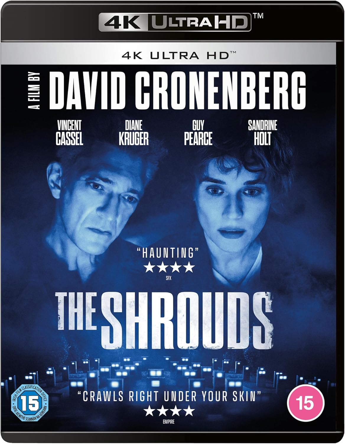 Blu-ray cover for "The Shrouds" featuring two faces partially wrapped in bandages.