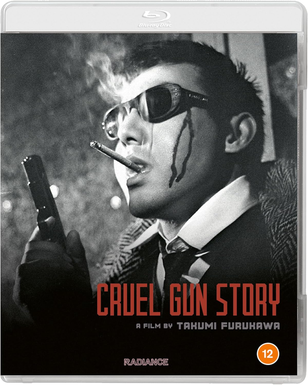 Black and white Blu-ray cover featuring a man with a gun and cigarette.