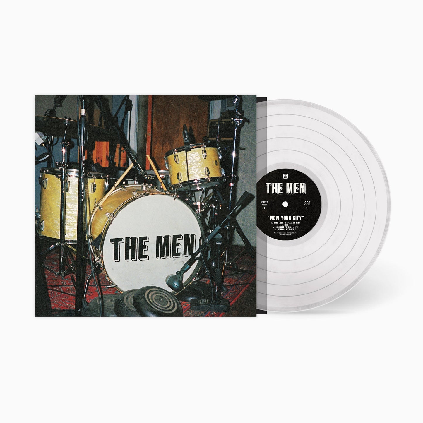 Clear vinyl record next to its album cover featuring a drum kit.
