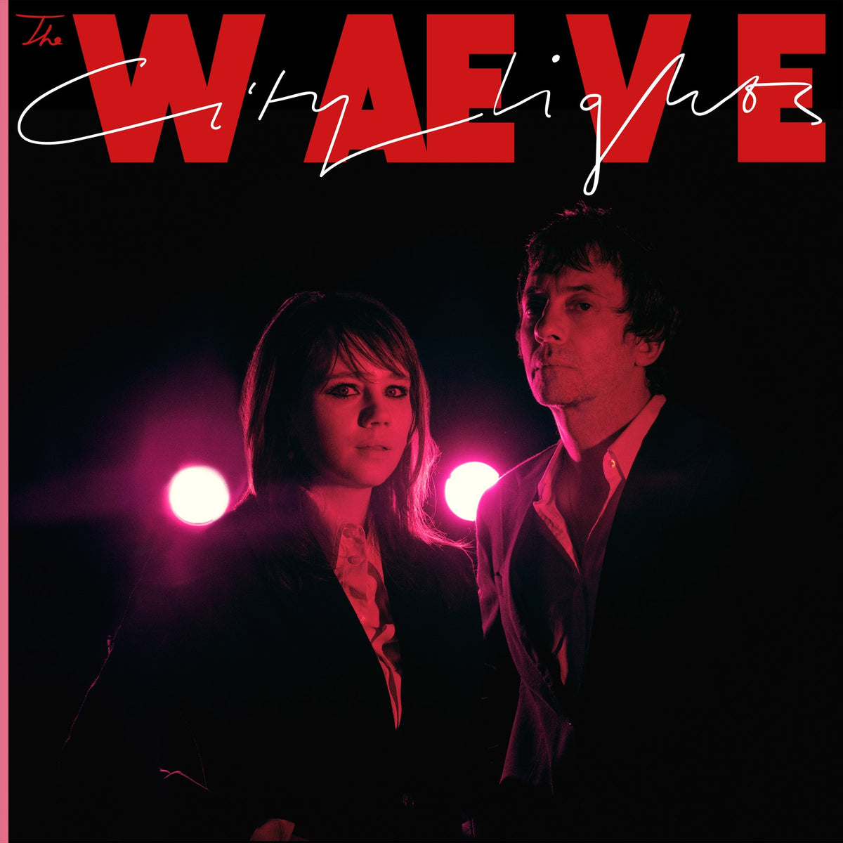 CD cover for "City Lights" featuring two people in pink light.