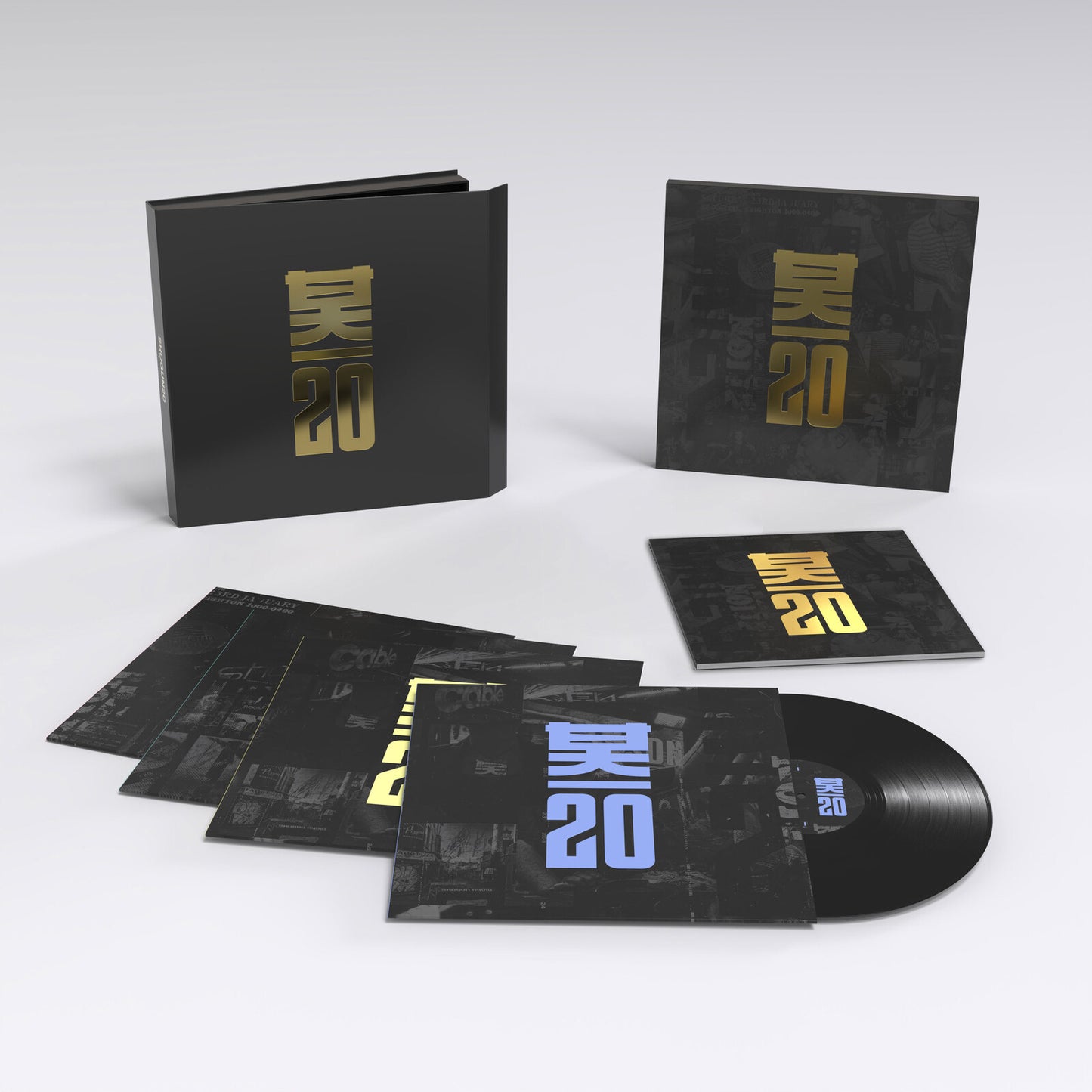 Black vinyl record box set with gold lettering and accompanying booklets.