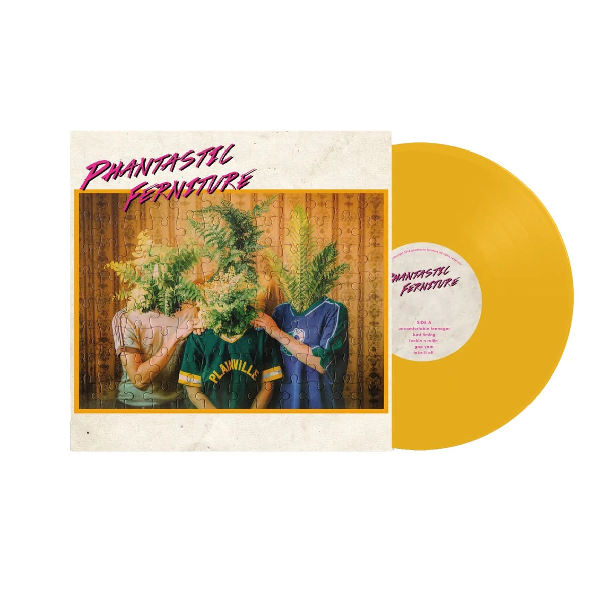 Yellow vinyl record with cover art of a person amidst puzzle pieces.