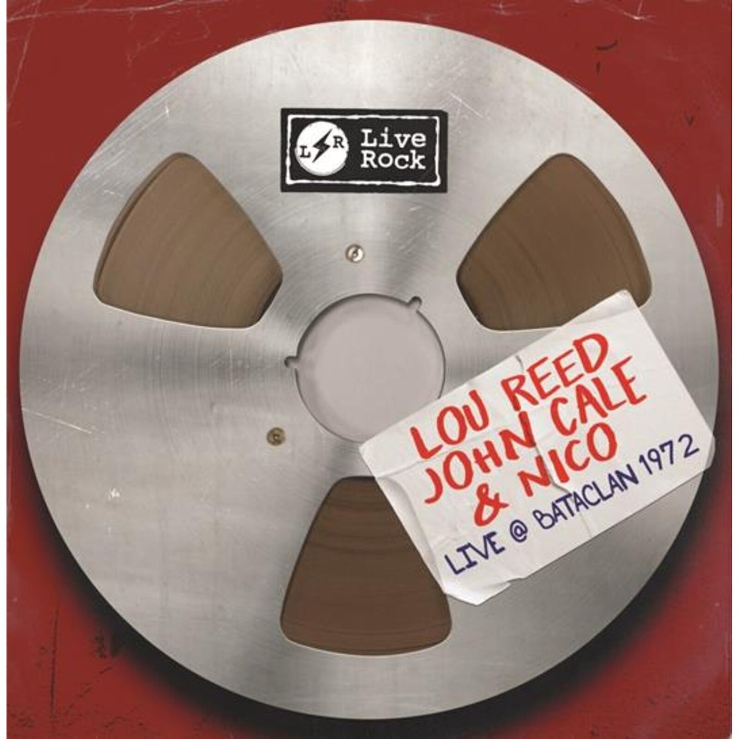 Vinyl record cover featuring a metallic reel-to-reel tape on a red background.