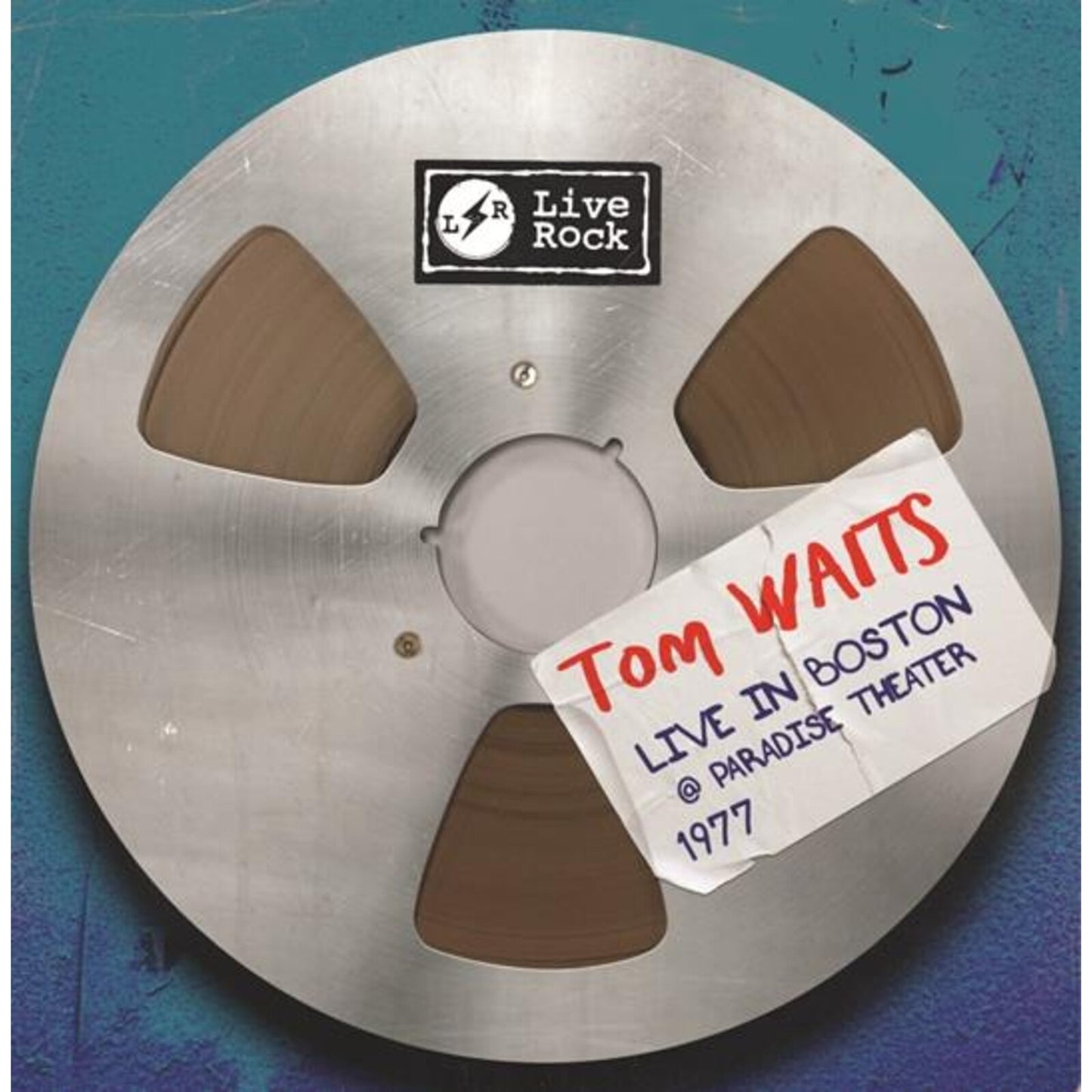 Reel-to-reel tape with “Tom Waits Live in Boston 1977” label.