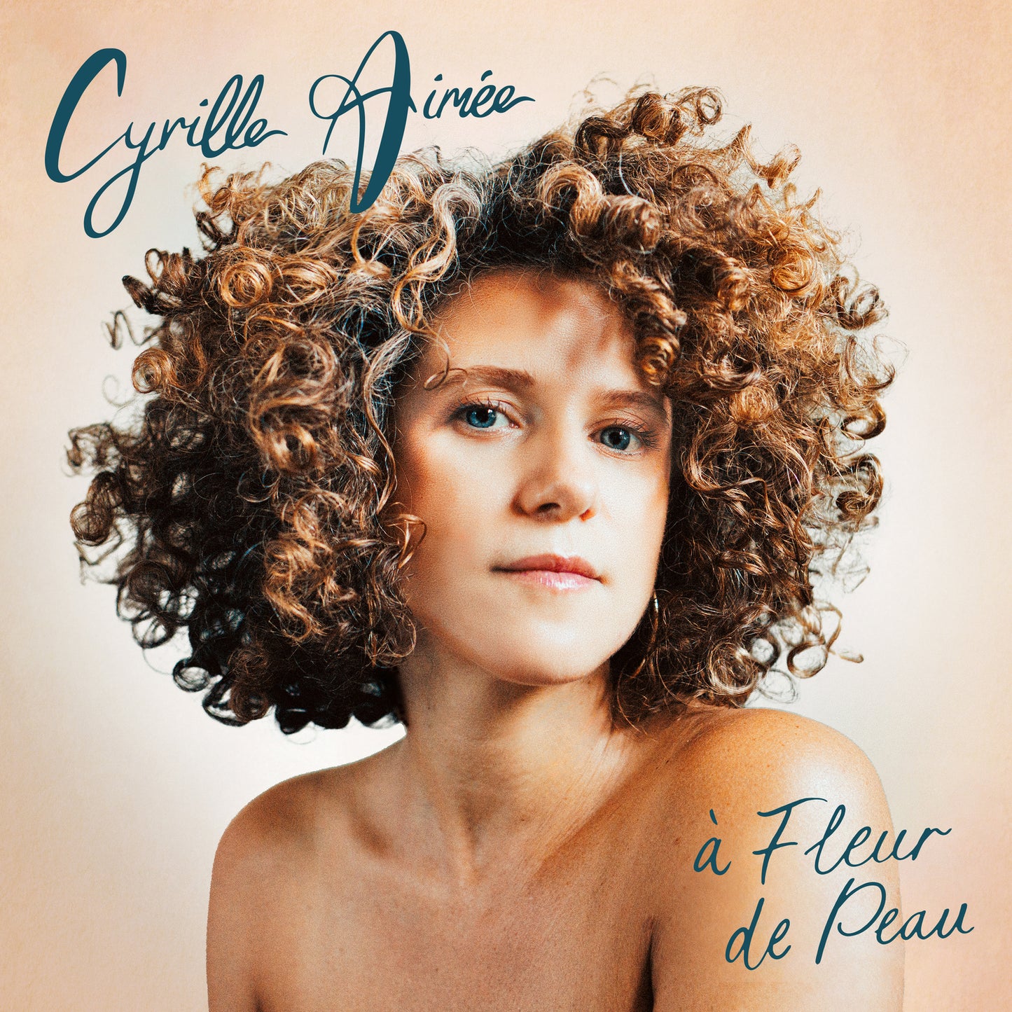 Cyrille Aimee album cover featuring a portrait of the singer with curly hair.